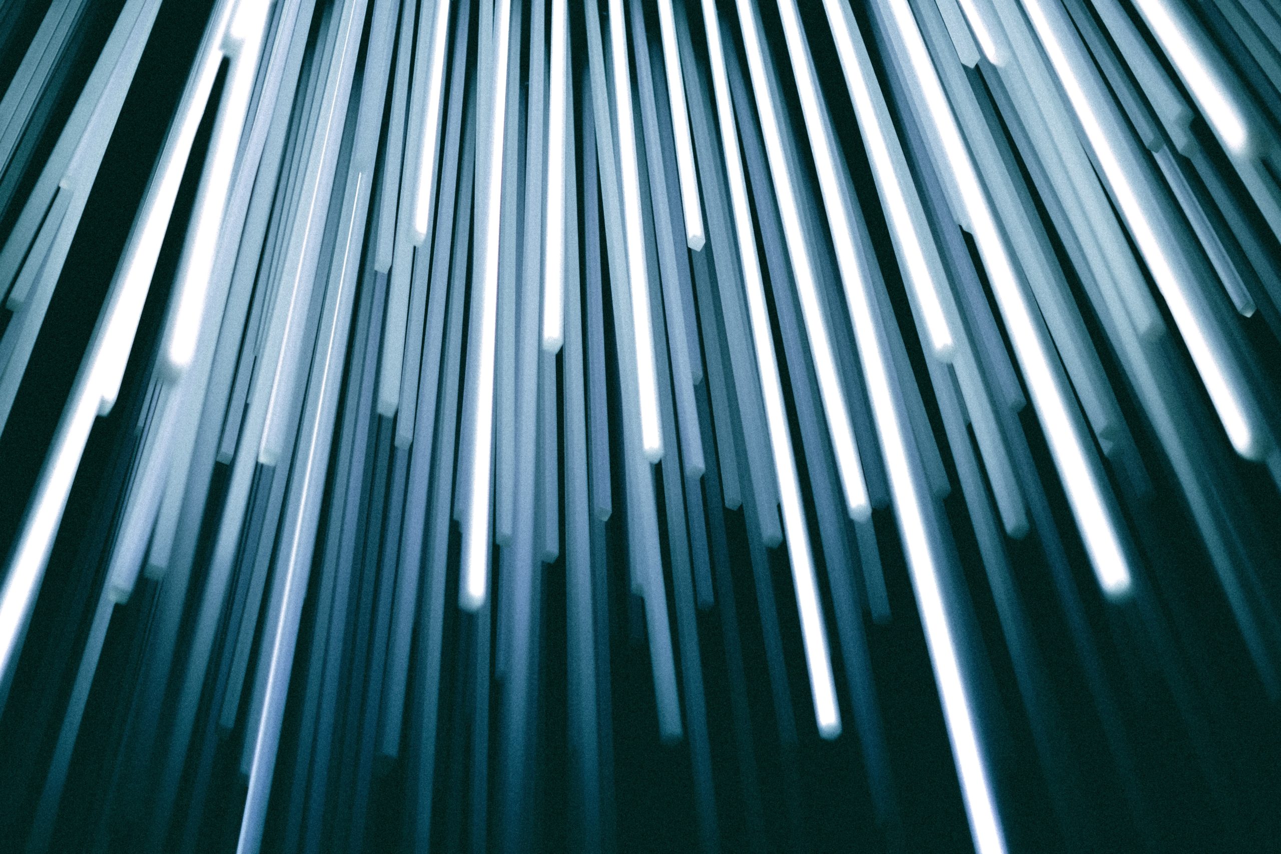 an abstract image of blue and white tube lights